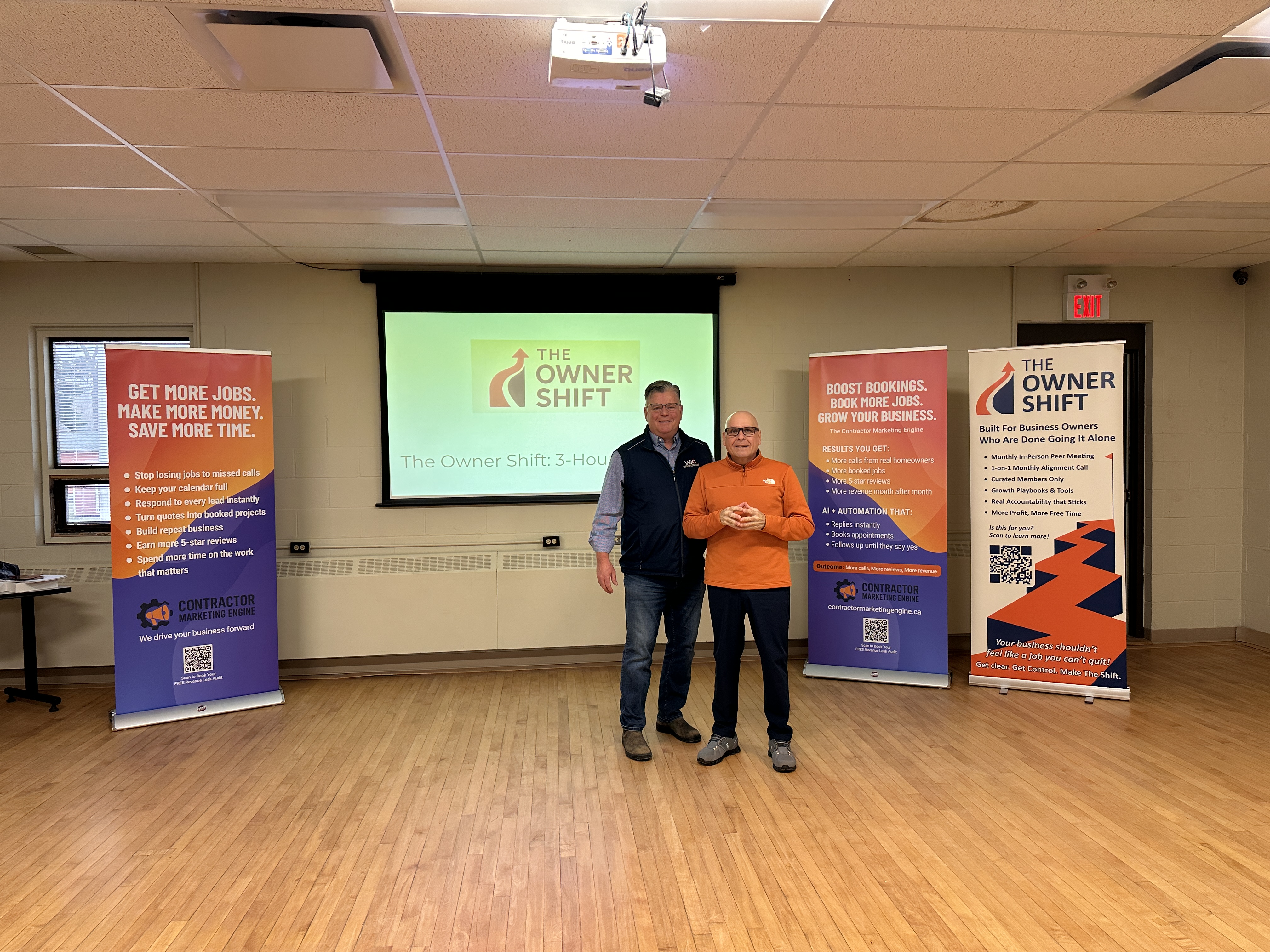 Paul Meyers presenting The Owner Shift workshop with banner displays